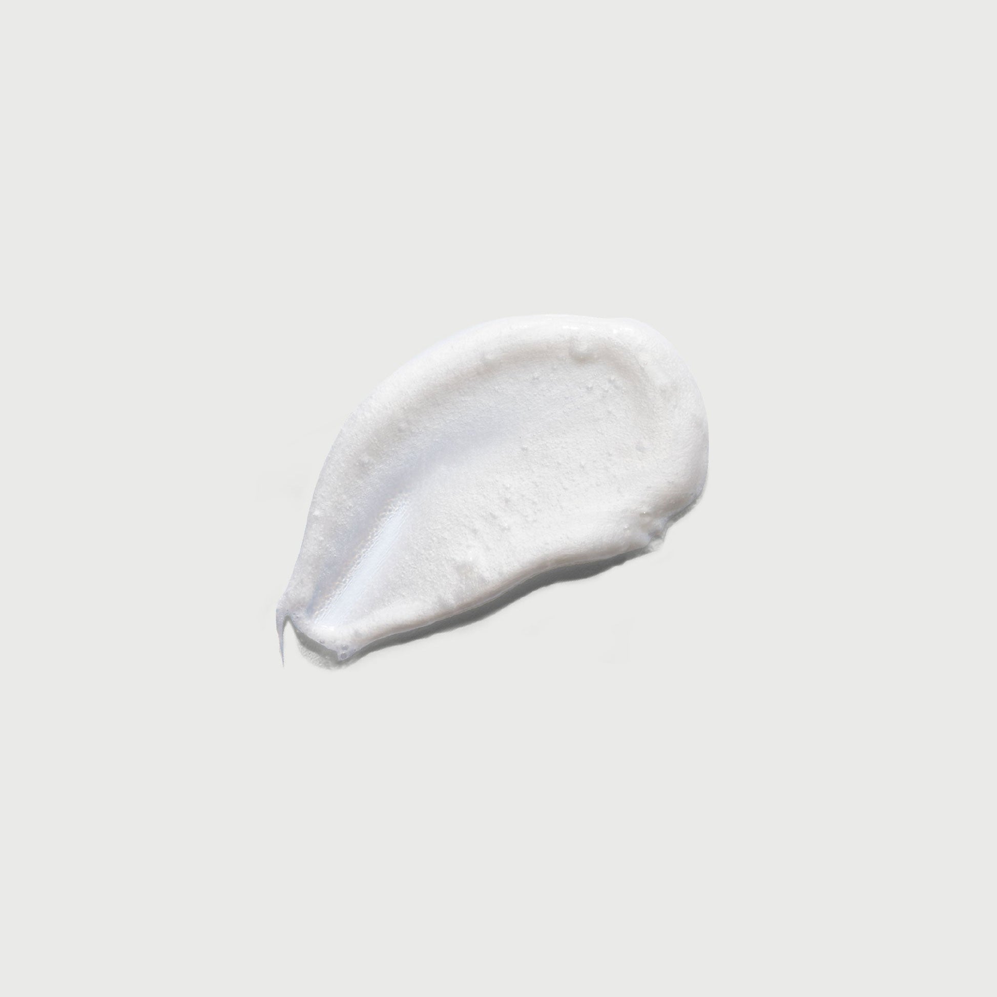 the-smoother-glycolic-acid-exfoliating-body-wash-o1 NATR-40002-Swatch-The-Smoother-Glycolic-Acid-Exfoliating-Body-Wash-bonebkgd.jpg