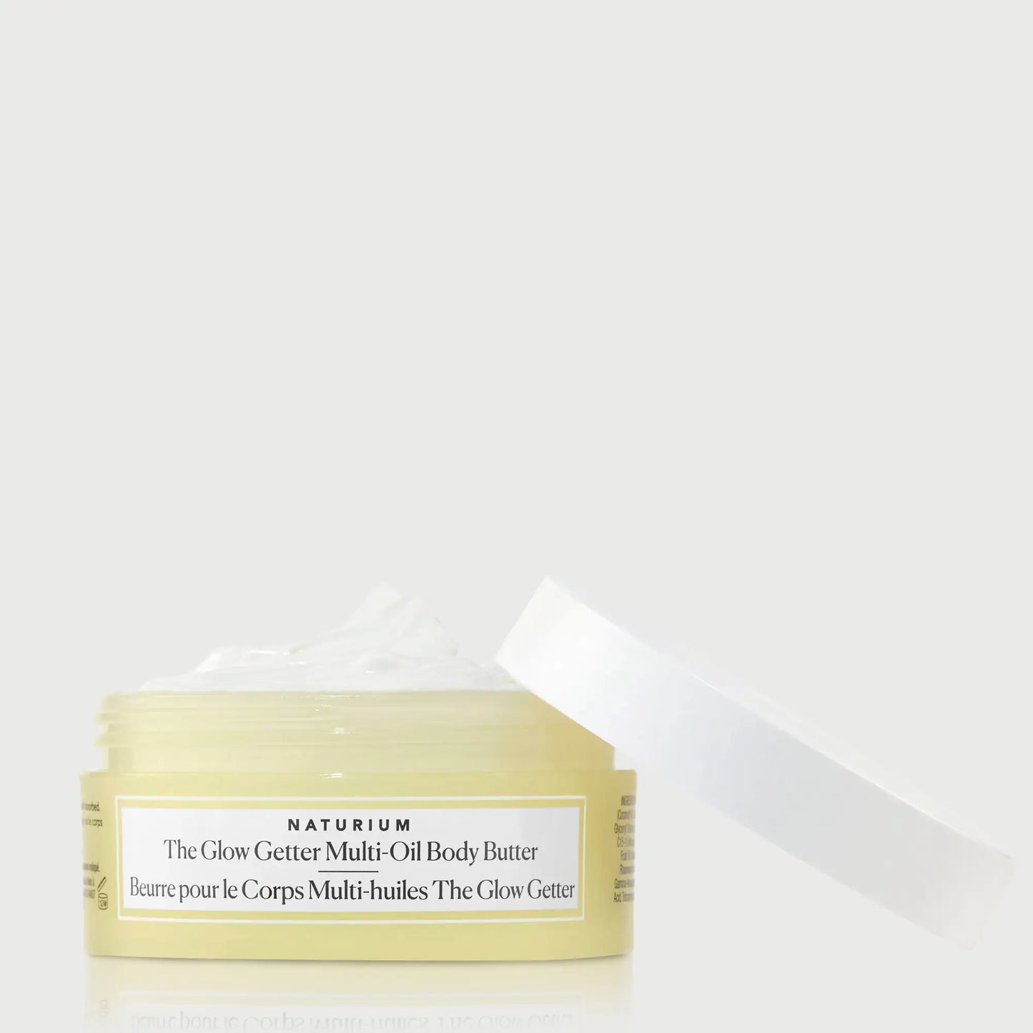 the-glow-getter-multi-oil-body-butter-travel-size-r6 NATR-40115_Glow-Getter-Body-Butter-Mini_front_capoff_bonebkgd.webp